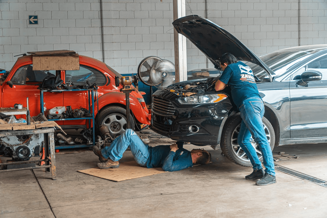 Professional car dent repair and panel beating service at workshop